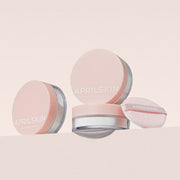 APRILSKIN Blur Skin Powder 10g by ProtoClinical shown with front-facing compact packaging on a simple background for a k-beauty makeup routine.