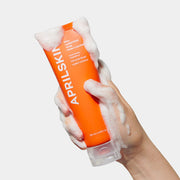 APRILSKIN Carrotene Acne Foam Cleanser 120ml by ProtoClinical displayed in a clean product layout featuring the cleanser tube for a k-beauty skincare routine.