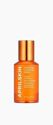 ProtoClinical k-beauty APRILSKIN Carrotene Clarifying Serum 37ml single upright orange serum bottle centered on a pale aqua and cream background