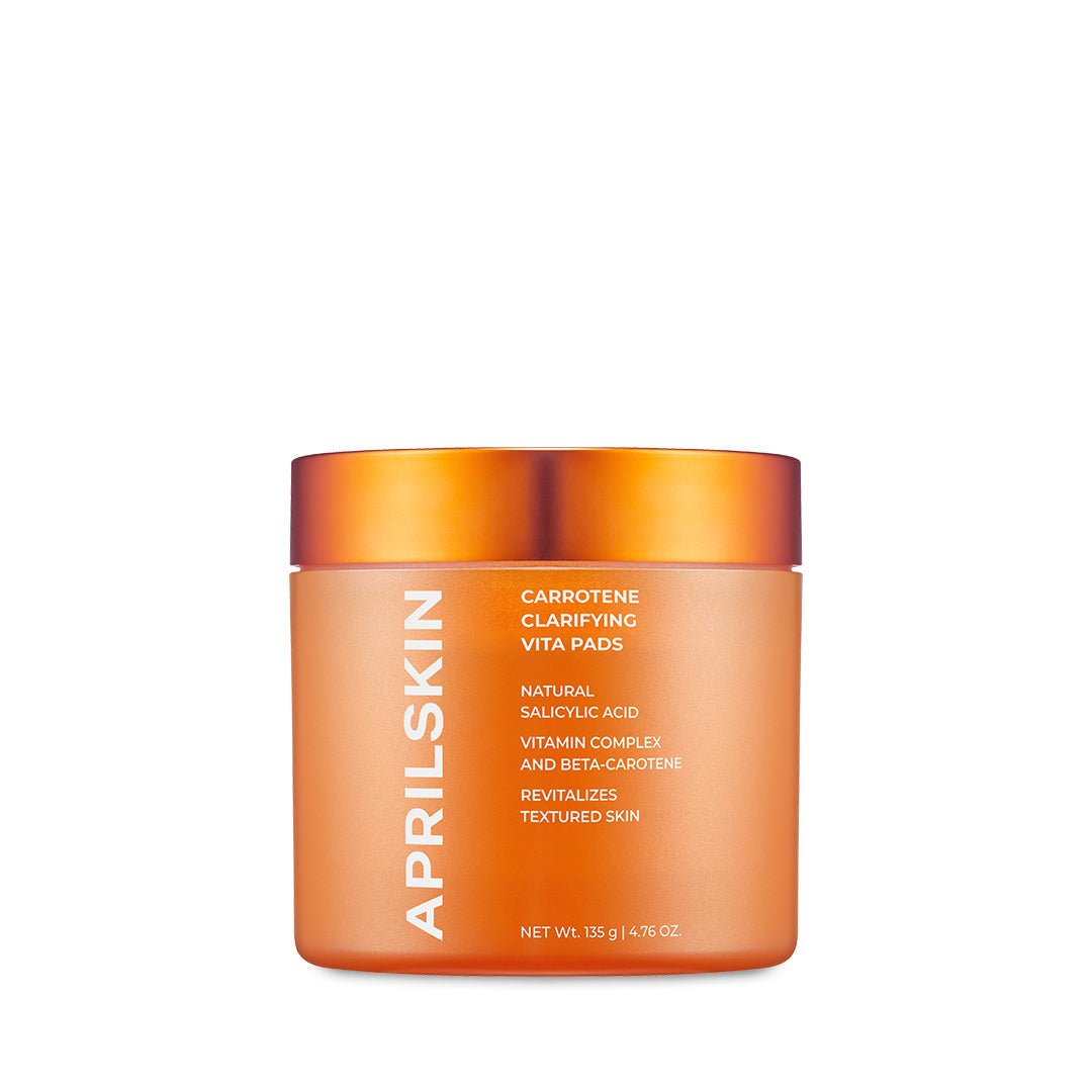 APRILSKIN Carrotene Clarifying Vita Pads 135g by ProtoClinical displayed in a front-facing vita pad packshot on a light background, highlighting the jar packaging for a k-beauty routine.