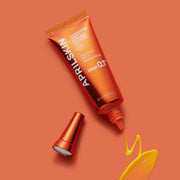 APRILSKIN Carrotene IPMP Clearing Solution 20ml by ProtoClinical shown in a branded detail graphic with the clearing solution tube for a k-beauty routine.
