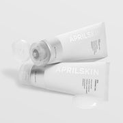 ProtoClinical k-beauty APRILSKIN Firming & Refining Spa Massage Gel For Face And Body 150ml two gray massage gel packages side by side on a light background.