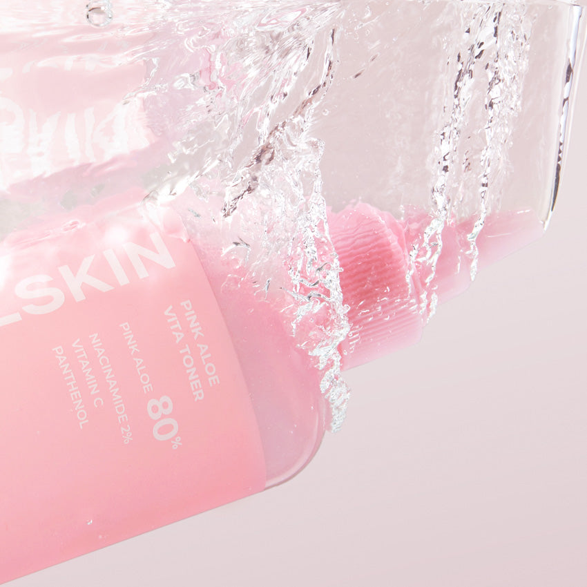 APRILSKIN Pink Aloe Vitamin C Soothing & Brightening Toner 250ml by ProtoClinical displayed in a neat product composition highlighting the bottle design for a k-beauty skincare routine.
