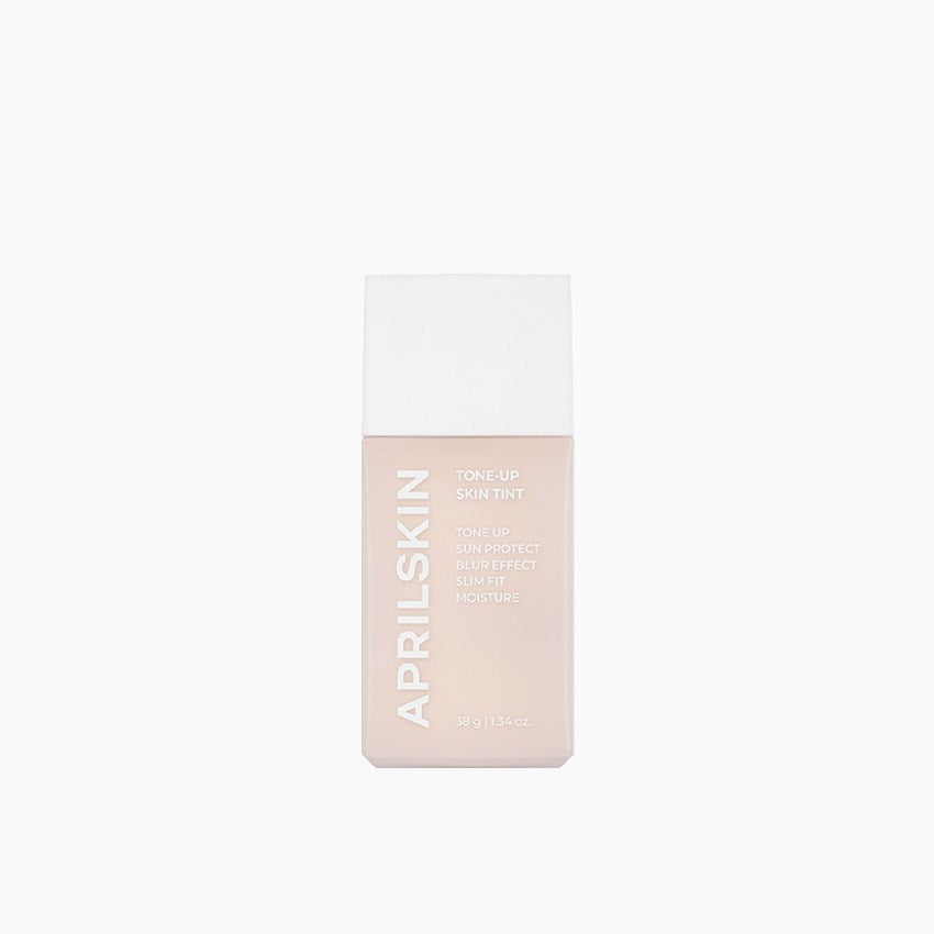 APRILSKIN Tone Up Skin Tint 30g (SPF 50+) by ProtoClinical shown in a polished product shot on a light background, highlighting the skin tint tube packaging for a k-beauty routine.