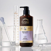 ProtoClinical k-beauty dark taupe vertical beauty product silhouette on a light background with pale side highlights.