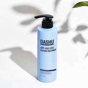 ProtoClinical k-beauty DASHU Daily Anti-Hair Loss Protein Treatment 500ml single upright blue treatment bottle centered on a pale cream and aqua background