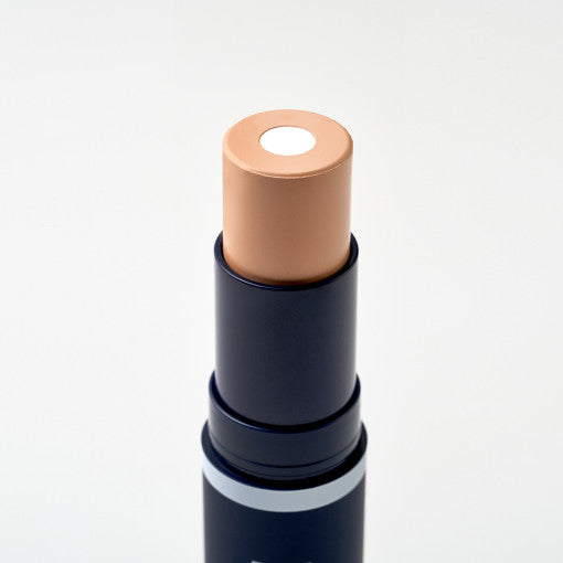 ProtoClinical k-beauty slim beige and gray beauty product silhouette centered on an off-white background.
