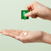 ProtoClinical k-beauty olive and beige skincare product packaging on a light background.
