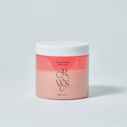 ProtoClinical k-beauty soft pink round beauty product on a pale aqua and white background.