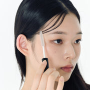 ProtoClinical k-beauty rose beauty product silhouette with deep berry tones on a muted taupe background.