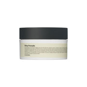 ProtoClinical k-beauty soft gray beauty product with dark side bands on a white background.