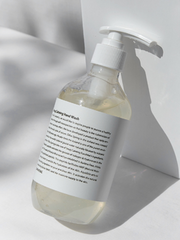 ProtoClinical k-beauty gray-green beauty product graphic with a dark vertical center on a light background.