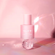 ProtoClinical k-beauty soft pink beauty graphic with a pale center and a deep plum lower-right accent.