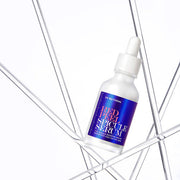 ProtoClinical k-beauty [so natural] Red Peel Spicule Serum 50ml single pale blue serum bottle with a dark round base on a cool white and blue striped background