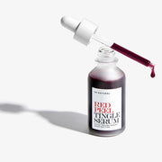 ProtoClinical k-beauty [so natural] Red Peel Tingle Serum 35ml shown as a single gray serum bottle centered on a pale cream and lavender background