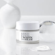 ProtoClinical k-beauty [so natural] Red Peel White Cream 50g single upright gray cream package centered on a cool white and pale blue striped background