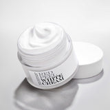ProtoClinical k-beauty [so natural] Red Peel White Cream 50g single upright gray cream package centered on a cool white and pale blue striped background