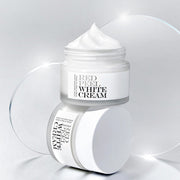 ProtoClinical k-beauty [so natural] Red Peel White Cream 50g single upright gray cream package centered on a cool white and pale blue striped background