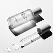 ProtoClinical k-beauty [so natural] White Water Ampoule Serum 50ml shown in three gray package views arranged diagonally on a pale beige background
