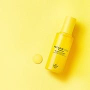 ProtoClinical k-beauty [so natural] Yellow Cica Ampoule 50ml shown as a single upright yellow ampoule bottle centered on a bright yellow background