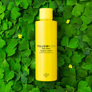 ProtoClinical k-beauty [so natural] Yellow Cica Toner 260ml shown as a single upright yellow bottle centered on a dark green background
