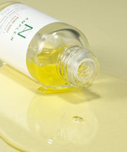 ProtoClinical k-beauty yellow-green cosmetic product graphic on a pale lavender and white background.