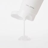 ProtoClinical k-beauty vertical beauty product packaging on a soft white and pale lavender background.