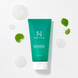 ProtoClinical k-beauty mint beauty product packaging with soft pink accents on a light background.