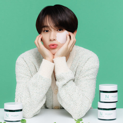 ProtoClinical k-beauty centered beauty product on a teal and pink background.