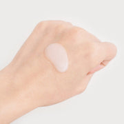 ProtoClinical k-beauty peach-centered beauty graphic on a pale blue and cream background.