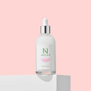 ProtoClinical k-beauty soft peach beauty graphic fading into a cool gray background.