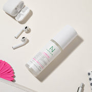 ProtoClinical k-beauty cream and lavender beauty product packaging on a soft neutral background.