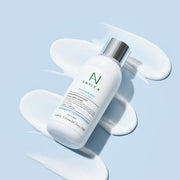 ProtoClinical k-beauty pale blue beauty graphic on a soft neutral background.
