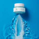 ProtoClinical k-beauty blue skincare product packaging with light aqua and dark blue panels.
