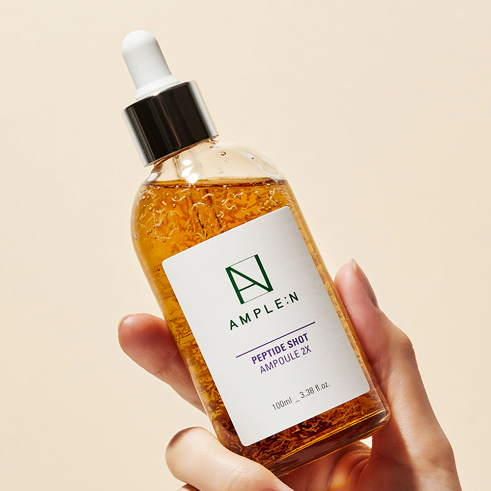 AMPLE:N Peptide Shot Ampoule 2X Jumbo 100ml by ProtoClinical shown in front-facing jumbo ampoule packaging on a clean white background, highlighting the large bottle and branded label for a k-beauty skincare routine.