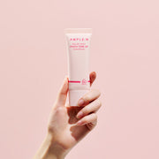 AMPLE:N Solar Shot Peach Tone Up Suncream 40ml by ProtoClinical displayed as a close product packshot with the peach tone-up suncream tube on white for a k-beauty skincare routine.
