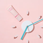 AMPLE:N Solar Shot Peach Tone Up Suncream 40ml by ProtoClinical presented with the sunscreen tube and soft peach packaging on a light background for a k-beauty skincare routine.
