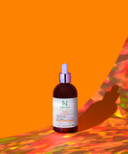ProtoClinical k-beauty warm orange beauty graphic on a vivid orange background.