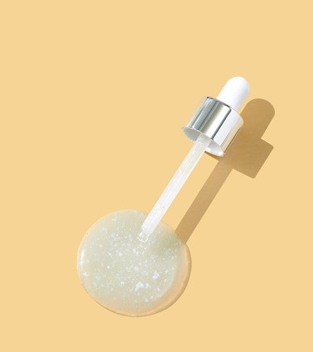 ProtoClinical k-beauty peach-toned cosmetic graphic on a warm orange background.