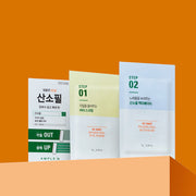 ProtoClinical k-beauty cosmetic packaging with orange and pale blue tones on a light background.