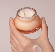 ProtoClinical k-beauty warm beige beauty detail with two soft vertical forms on a muted background.