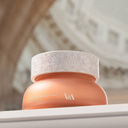 ProtoClinical k-beauty warm beige beauty detail with soft brown horizontal forms on a muted background.