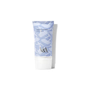 ProtoClinical k-beauty pale blue beauty bottle silhouette centered on a light background with a soft beige lower edge.
