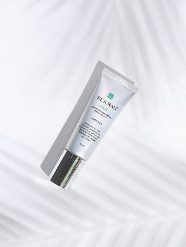 ProtoClinical k-beauty soft gray beauty graphic with a rounded central silhouette on a light background.
