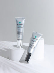 ProtoClinical k-beauty gray beauty graphic with soft vertical bands on a light background.