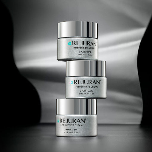 ProtoClinical k-beauty dark beauty packaging silhouette with silver central highlights on a black background.