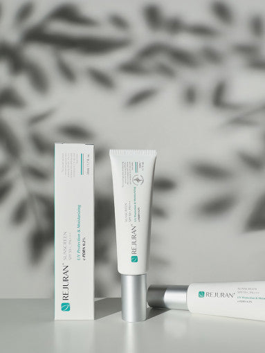 ProtoClinical k-beauty soft gray beauty panel with a warm beige center on a light background.