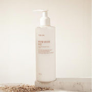 ProtoClinical k-beauty Shingmulnara White Rice Bright Tone Lotion 300ml shown in a single centered upright packshot in soft beige-pink tones with pale yellow side shading on a light background