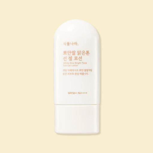 ProtoClinical k-beauty Shingmulnara White Rice Bright Tone Sun Gel Lotion 60ml SPF50+ PA++++ multiple warm gold and honey-toned gel lotion packages arranged side by side on a golden background.
