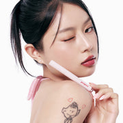 ProtoClinical k-beauty peripera Heart Jam Glow Lip single upright lip product with a dark cap and warm pink body on a light background